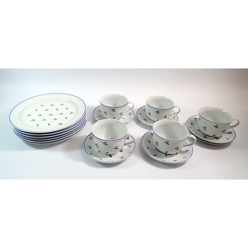 43 - A Polish floral breakfast set comprising five cups and six saucers and six breakfast plates