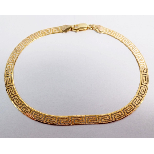 431 - A 9 carat yellow and white gold flat link bracelet with Greek key design, 3g, 19cm long