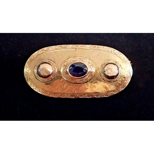 457 - An unusual studio jewellery 18 carat gold large oval brooch set oval blue stone flanked by two circu... 