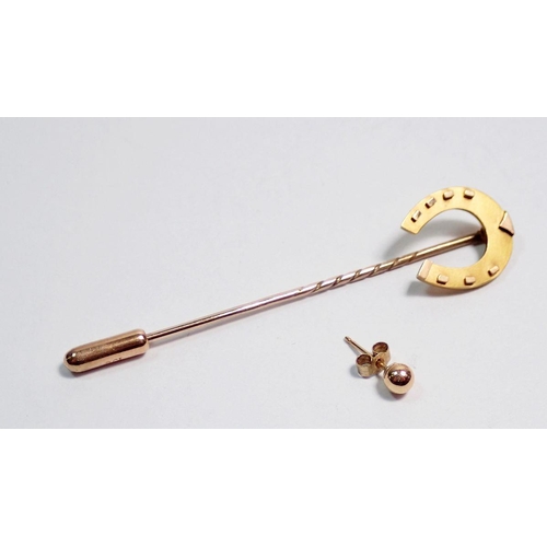 459 - A 15 carat gold horseshoe stick pin etc. 1.8g