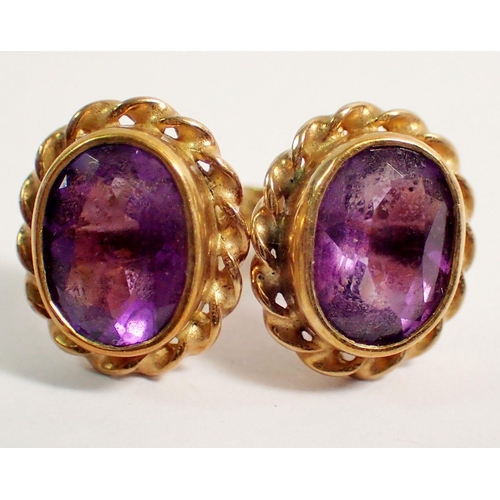 471 - A pair of 9 ct gold oval amethyst earrings 2.8g