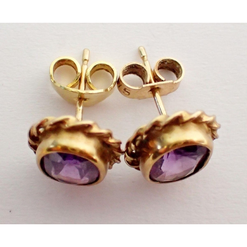 471 - A pair of 9 ct gold oval amethyst earrings 2.8g