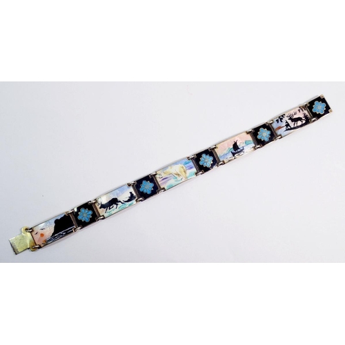 493 - A Norwegian silver and enamel bracelet set alternate floral and landscape links, clasp a/f