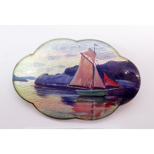 494 - A Norwegian silver and enamel oval lobed brooch decorated lake and yacht scene by Gustav Gaudernack,... 