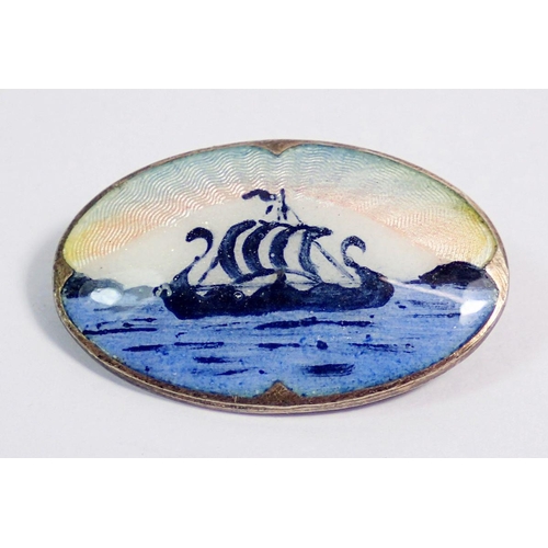 496 - A Norwegian silver and enamel oval brooch decorated ship by Ivor Holth, 2.5 x 2cm