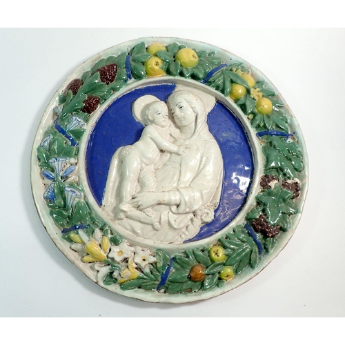 5 - A Della Robbia style Madonna wall plaque, 46cm diameter, repaired