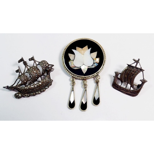 508 - A silver ship marcasite brooch, silver mother of pearl brooch and silver Scottish boat brooch