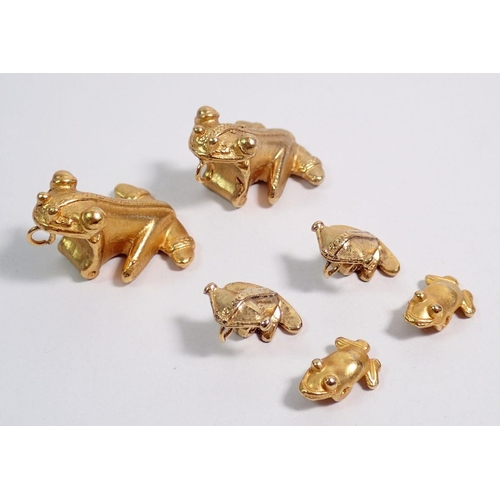 511 - Six various Pre-Columbian style gold plated frog pendants, largest 3cm long