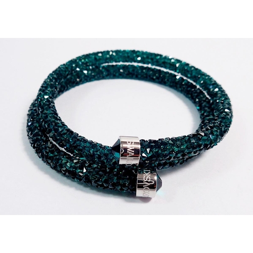 518 - A Swarovski green crystal snake bracelet, boxed