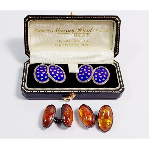 521 - A pair of silver and amber cufflinks and a pair of silver and blue enamel cufflinks with box