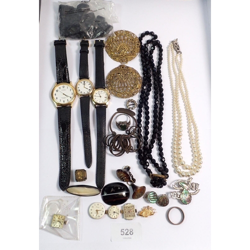 528 - A group of costume jewellery and watches including a six sided seal, jet, silver and marcasite ring ... 