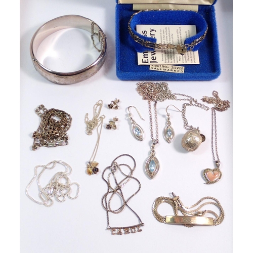 529 - A group of silver jewellery including gatelink bracelet, hinged bangle, necklaces and earrings