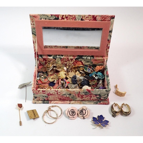 540 - A box of vintage earrings and badges