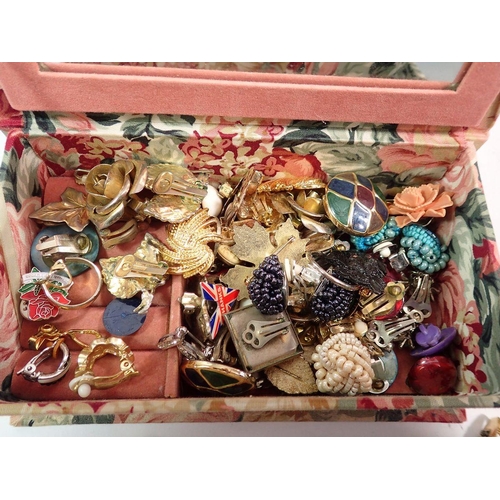 540 - A box of vintage earrings and badges