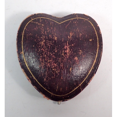 549 - A Victorian leather heart form jewellery box, 8cm wide