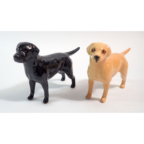 55 - Two Beswick Labrador dogs