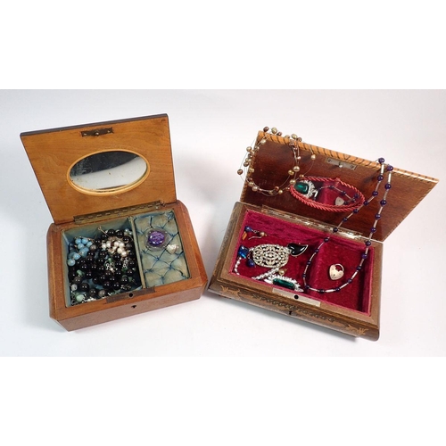 561 - Two musical jewellery boxes including a selection of costume jewellery, silver heart padlock, brooch... 