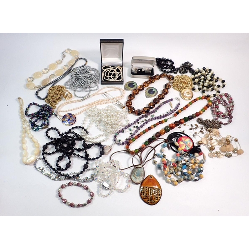 570 - A box of costume jewellery including necklaces etc