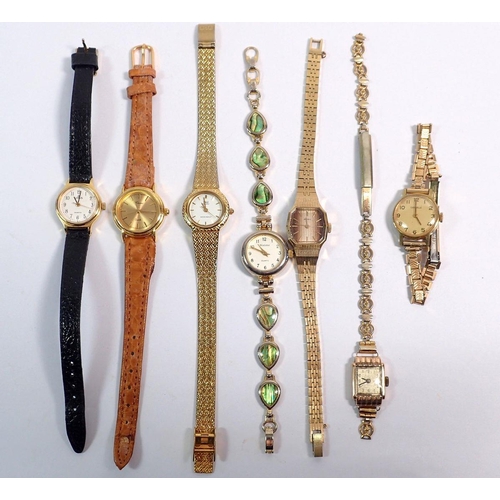 578 - A 9 carat gold ladies wrist watch with plated strap and six other ladies watches