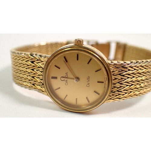 579 - An Omega De Ville gold plated ladies watch and another Omega gold plated wrist watch