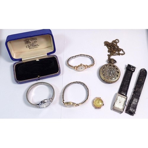 580 - A 9 carat gold ladies watch, three other watches etc.