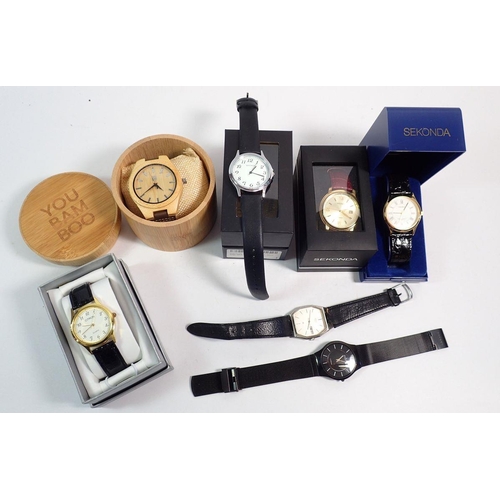 585 - A group of gentleman's watches including Skagen Titanium, Seiko, Sekonda etc - most boxed