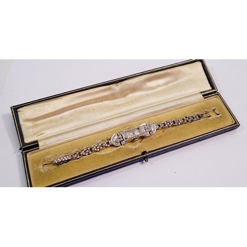 590 - A platinum Art Deco ladies wrist watch set diamonds (unmarked but tested), all on silver and paste s... 