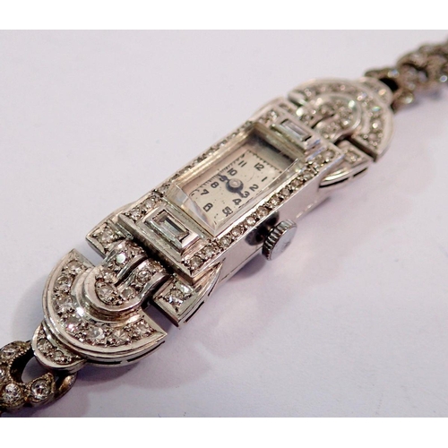 590 - A platinum Art Deco ladies wrist watch set diamonds (unmarked but tested), all on silver and paste s... 