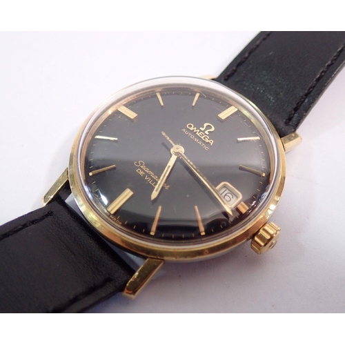 594 - An Omega Automatic Seamaster De Ville gentleman's gold plated wrist watch, black dial with baton hou... 