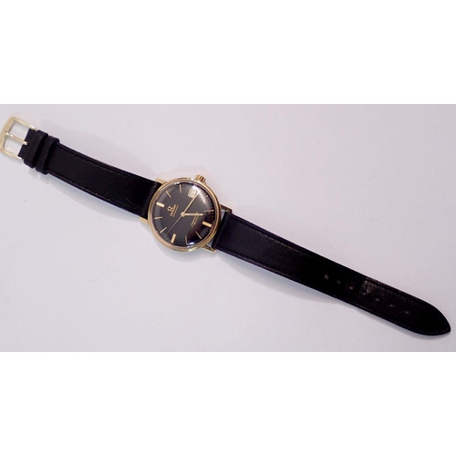 594 - An Omega Automatic Seamaster De Ville gentleman's gold plated wrist watch, black dial with baton hou... 