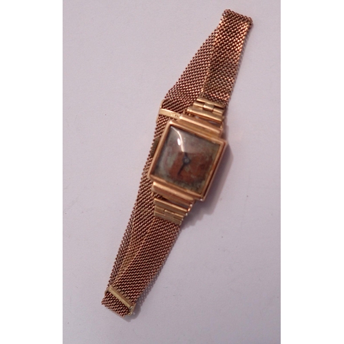 598 - An 18 carat gold ladies watch on 9 carat gold strap, total weight 14.5g