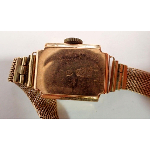 598 - An 18 carat gold ladies watch on 9 carat gold strap, total weight 14.5g