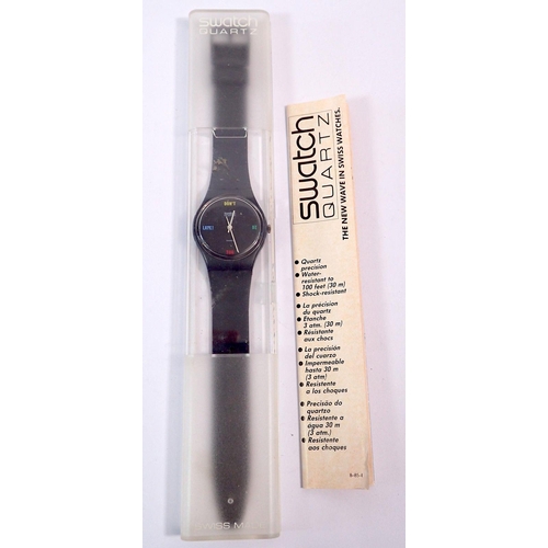 603 - A Swatch 'Don't Be Too Late' quartz watch in original case with paperwork, dated 1985