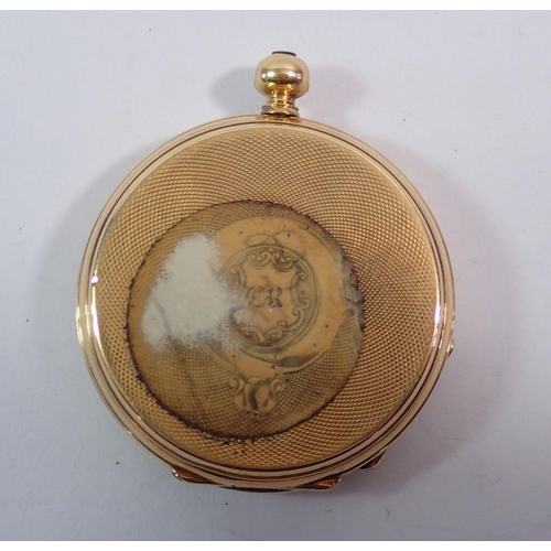 608 - An 18 carat gold small pocket watch dated and inscribed 1874, 4.2cm diameter - cased