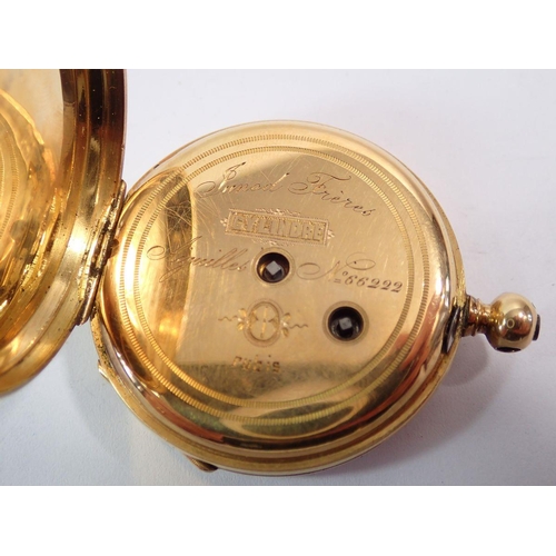 608 - An 18 carat gold small pocket watch dated and inscribed 1874, 4.2cm diameter - cased