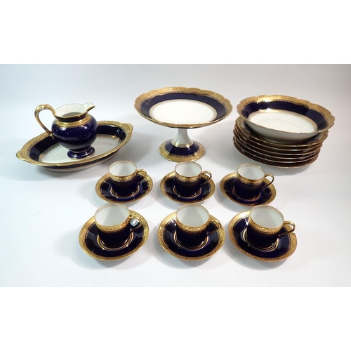 61 - A Limoges late 19th century porcelain blue and gilt edged coffee set by C Ahrenfeldt comprising six ... 