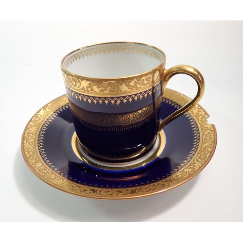 61 - A Limoges late 19th century porcelain blue and gilt edged coffee set by C Ahrenfeldt comprising six ... 