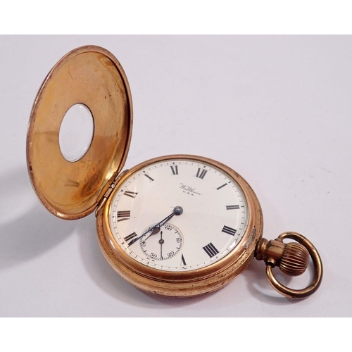 618 - A Waltham gold plated half hunter pocket watch in Dennison case on turned wood stand