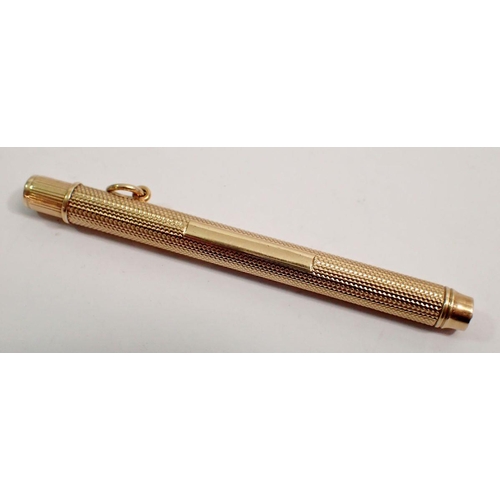 627 - A 9 carat gold Sampson & Mordan propelling pencil with engine turned decoration, London 1920, 8.5cm