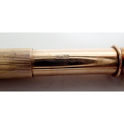 629 - A 9 carat gold Sampson & Mordan propelling pencil with removable case and fold over clasp, marked 37... 