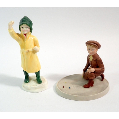 64 - A Wedgwood group of boy playing marbles and a Doughty figure fisherman, 12cm