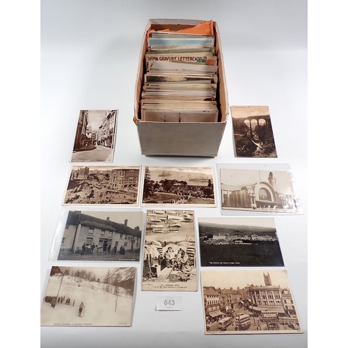 643 - A box of approximately 350 postcards including topographical, Australia, British, India, USA etc. RP... 