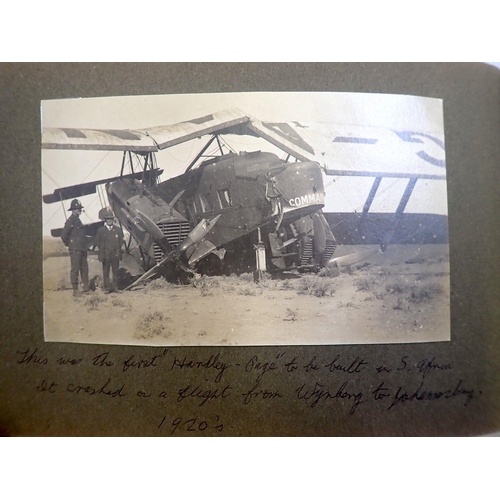 653 - An album of military maritime, army and aeroplane postcards and photographs etc.