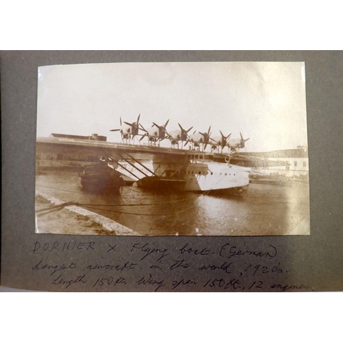 653 - An album of military maritime, army and aeroplane postcards and photographs etc.