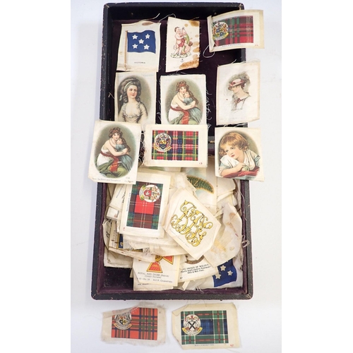 660 - A group of silk cigarette cards including some sets