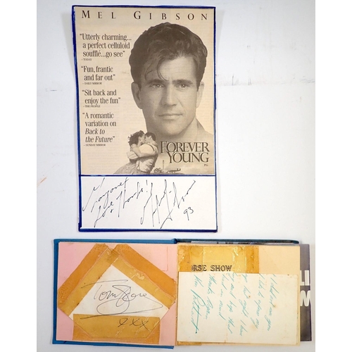 661 - A Mel Gibson autograph and and autograph album including Tom Jones