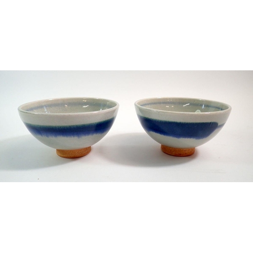 70 - Two Studio pottery blue banded bowls, signed, 12cm diameter