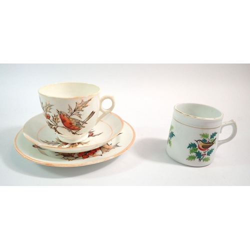 73 - A Victorian cup and saucer and tea plate decorated robin and holly and another robin mug