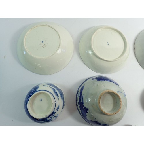 130 - A collection of 18th century English blue and white porcelain tea ware including trio, sparrow beak ... 