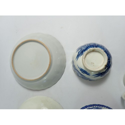 130 - A collection of 18th century English blue and white porcelain tea ware including trio, sparrow beak ... 